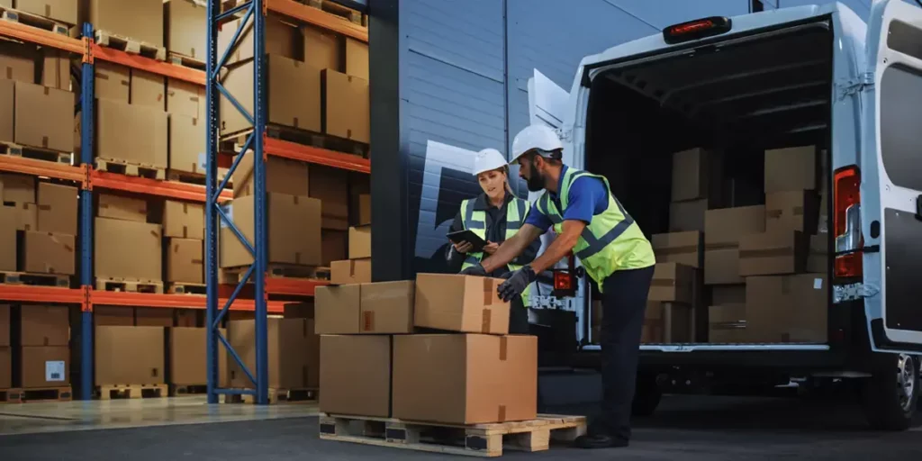 Warehouse workers unloading freight at a dock