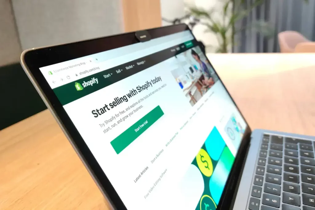 open laptop with Shopify website on the screen